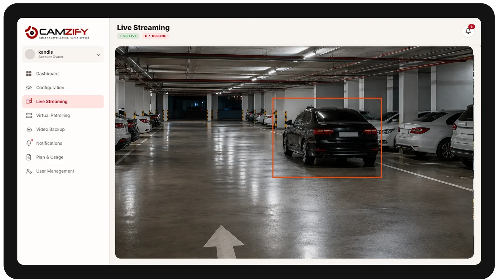 Live streaming from a property camera with people and vehicles outlined as they are tracked