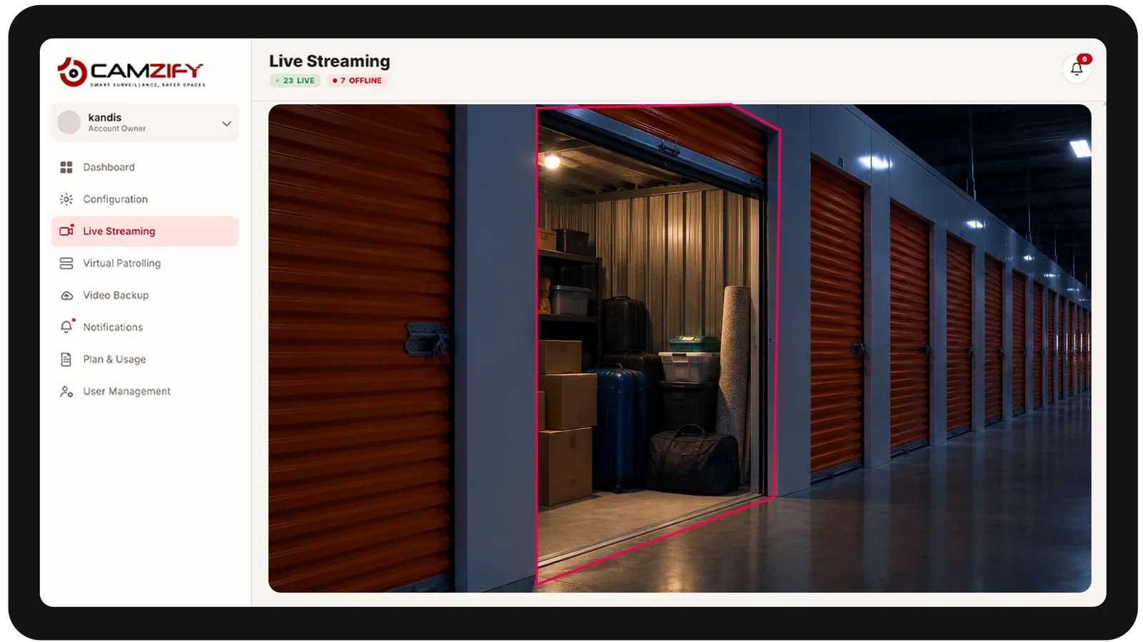 Live streaming from a self-storage camera with people and vehicles outlined as they are tracked